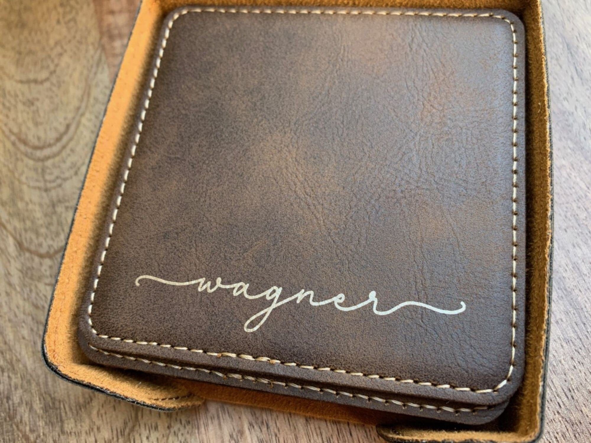 close up of name engraved on coasters