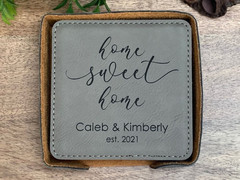 leatherette coasters set of 6 with holder engraved with home sweet home and personalized with two first names and the est. year