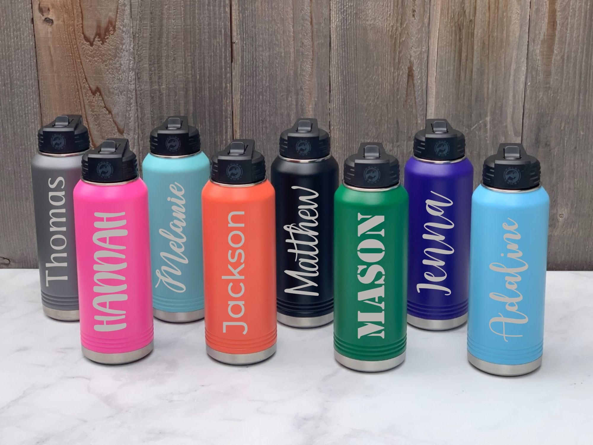 https://www.runwildengraving.com/cdn/shop/products/engraving-32-oz-name-8-choices-32-oz-laser-engraved-water-bottle-personalized-with-name-29701377687719.jpg?v=1681021622