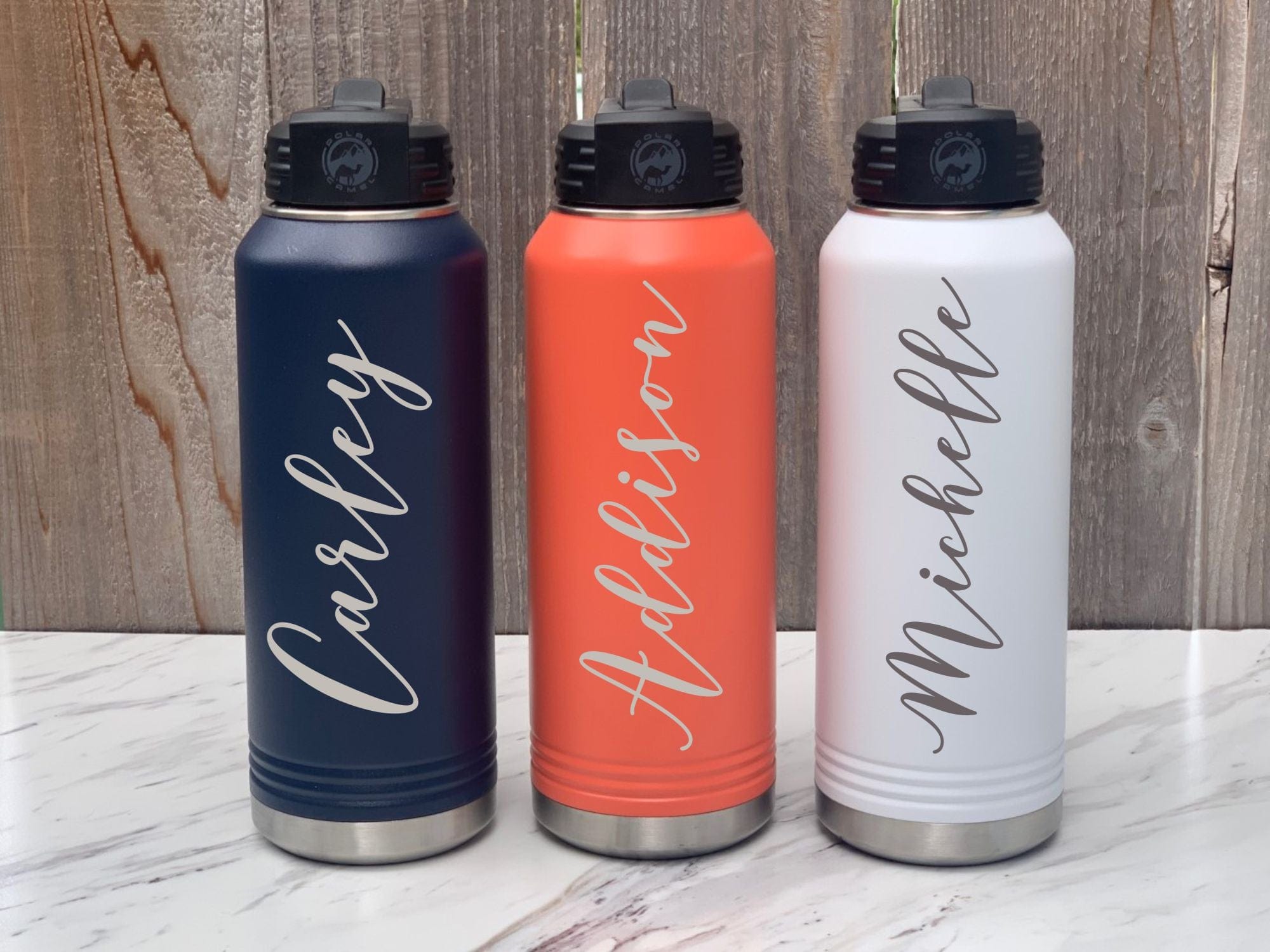 https://www.runwildengraving.com/cdn/shop/products/engraving-32-oz-name-double-wall-insulated-32oz-water-bottle-engraved-with-name-29702883279015.jpg?v=1681030633